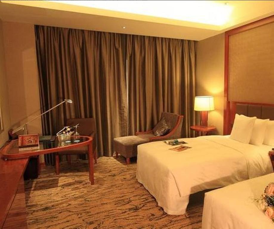 Gloria Grand Hotel Wuxi Уси Екстериор снимка