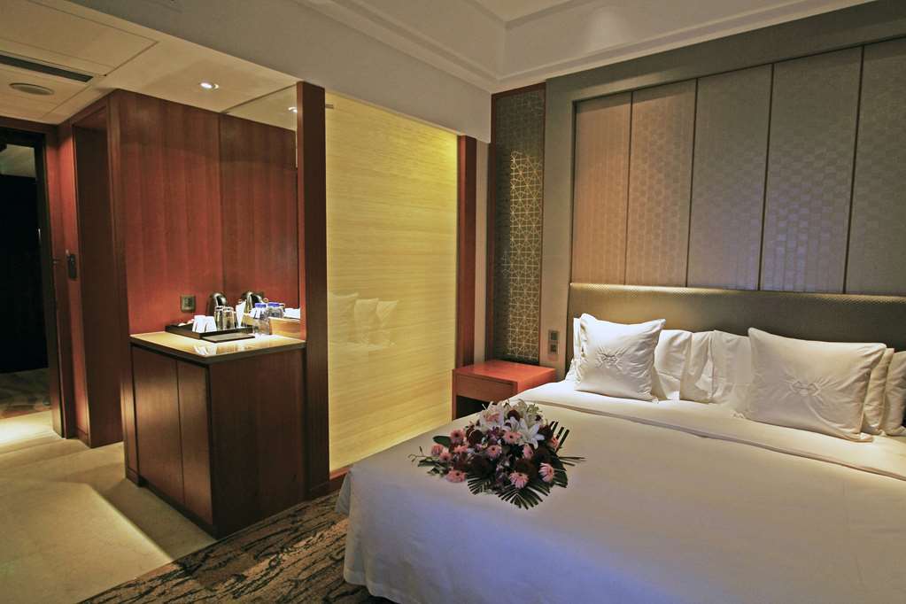 Gloria Grand Hotel Wuxi Уси Стая снимка