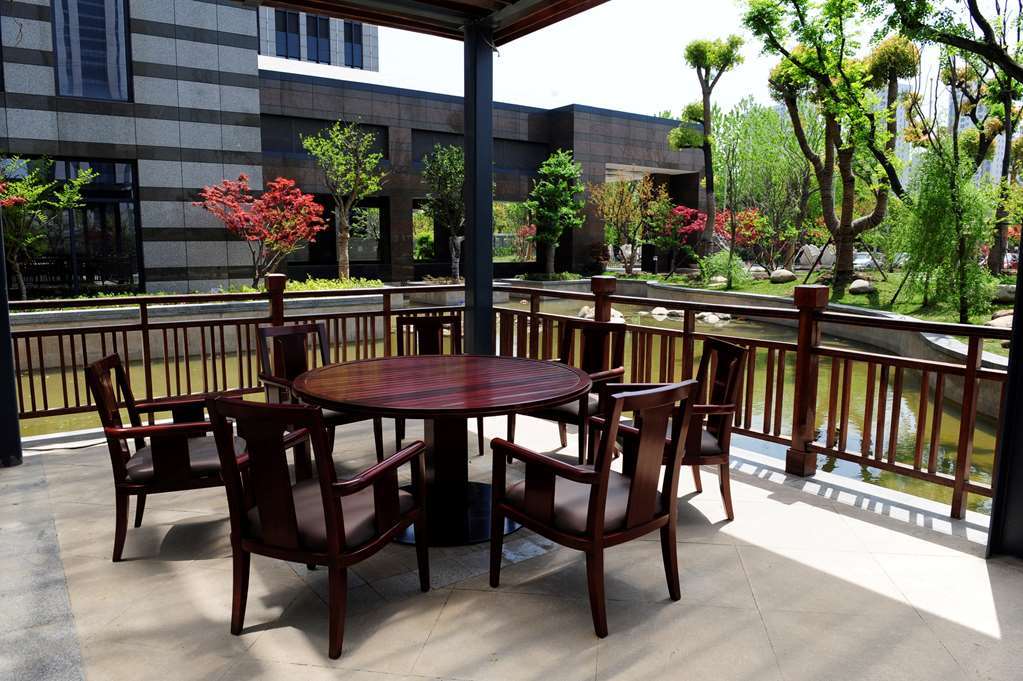 Gloria Grand Hotel Wuxi Уси Ресторант снимка